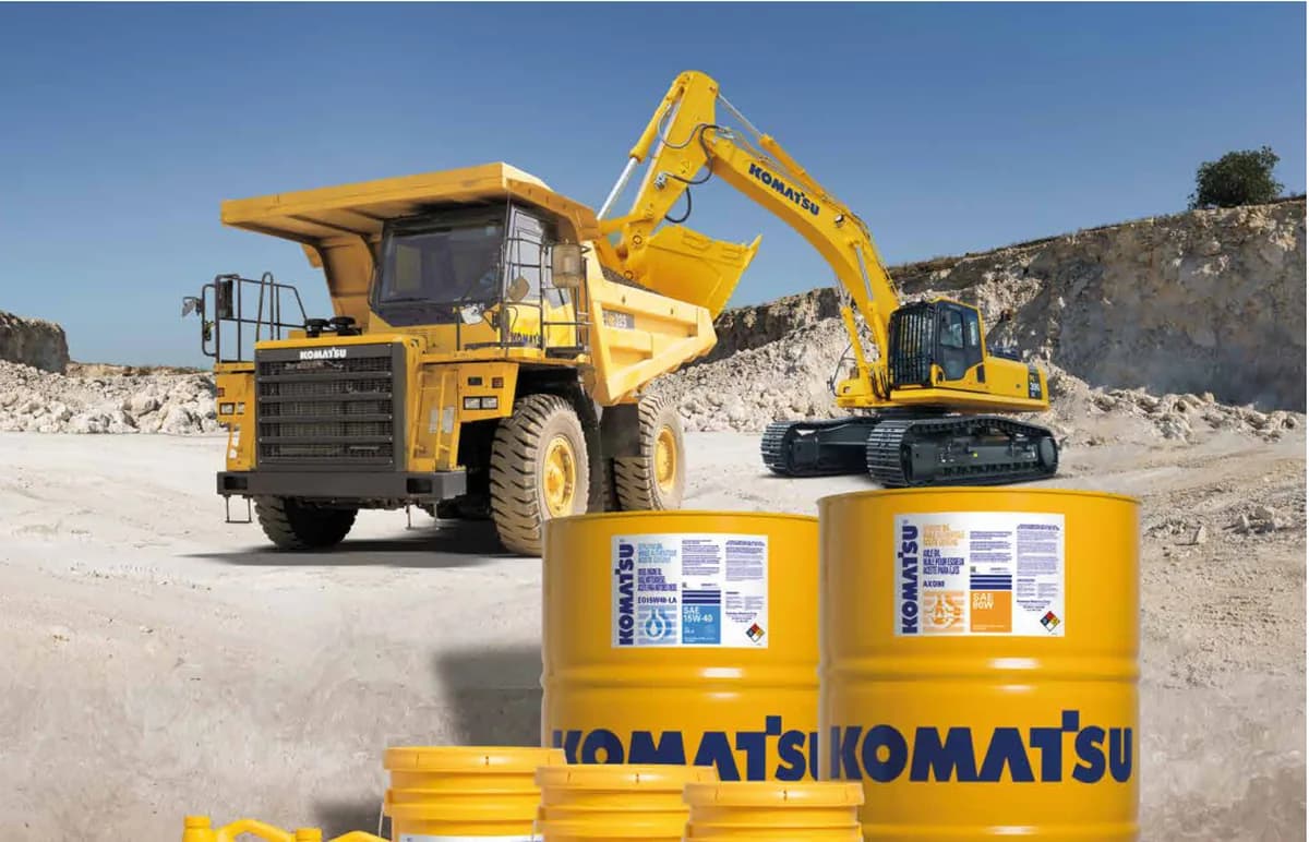 Genuine Komatsu oils and lubricants at a quarry with HD truck and excavator